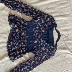 Dark floral top with belle sleeves and lace detail
